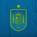 Camisa oficial de goleiro da seleção da Espanha 2026/27, cor azul ciano com padrões geométricos modernos.