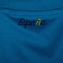 Camisa oficial de goleiro da seleção da Espanha 2026/27, cor azul ciano com padrões geométricos modernos.