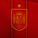 Camisa de futebol da seleção da Espanha titular vermelha com detalhes em azul e amarelo, com a personalização do jogador lamine yamal 10 temporada 2026/2027.
