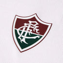 Camisa branca do Fluminense 2026-2027 reserva, detalhes em verde e bordô nos ombros e escudo oficial.