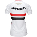 Camisa feminina do São Paulo FC 2026/2027 branca, modelo torcedor com patrocínio Superbet e corte acinturado.