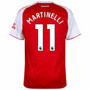 Camisa de futebol autêntica do Arsenal modelo titular (Home) para a temporada 2025-2026 da Adidas, na cor vermelha com mangas brancas. A visão geral destaca o padrão de monogramas em jacquard no corpo vermelho e as três listras clássicas da Adidas nos ombros. No peito, encontram-se o escudo bordado do Arsenal, o logo da Adidas e o patrocínio "Emirates Fly Better". A visão posterior (costas) exibe a personalização oficial com o nome "MARTINELLI" e o número "11" em branco. O tecido tecnológico possui acabamen
